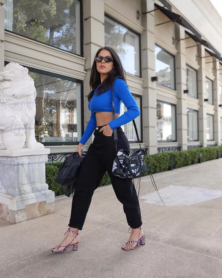 Look aeroporto com calça jeans feminina 